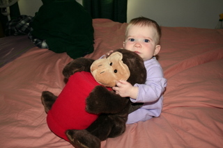 hugging a monkey